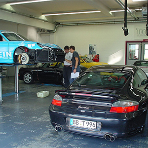 carshop with workers